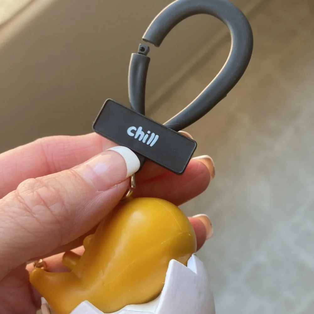 Gudetama keychain in good condition egg man